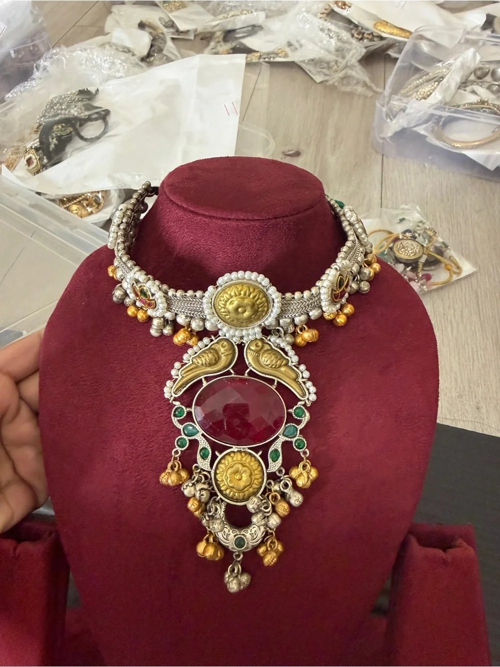 Handcrafted Silver-Tone Necklace with Deep Red Gem and Gold Accents